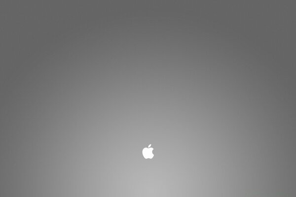 Сұр фонда өте кішкентай Apple алмасы
